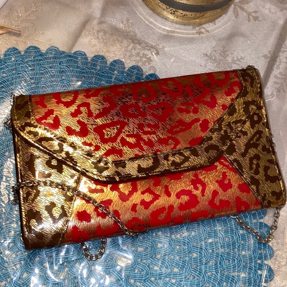 Brand-new beautiful clutch leopard gold and red
